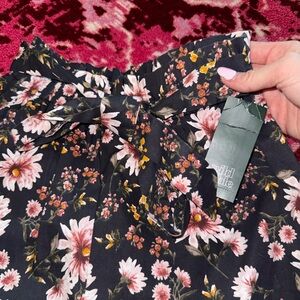 Floral Black shorts with tie belt.